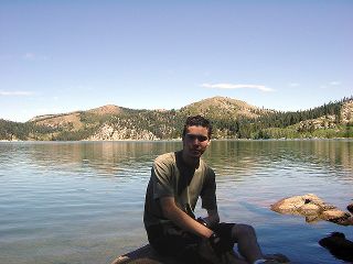 Matt at waters edge of Marlette Lake