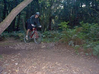 Matthew Griffin jumping log